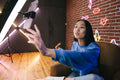 Creator filming a sponsored video with a ring light (Pexels licence)